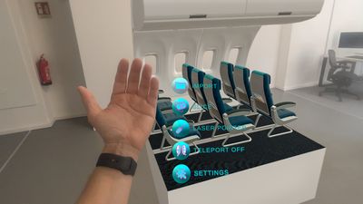 presentAR hand menu with Import, Slice, Laser Pointer, Teleport and Settings on Apple Vision Pro